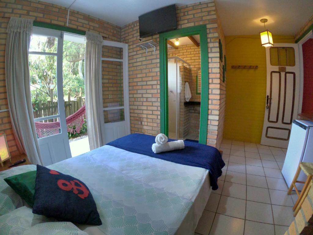 Pousada Canoa Azul Na Praia Da Ferrugem Garopaba Zimmer foto